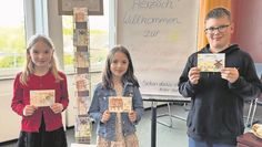 Postkarten mit den Motiven der drei Gewinner gibt es ab sofort bei „Lillemei“ und im Rathaus zu kaufen. Foto: eb