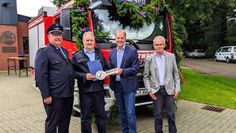 Offizielle Schlüsselübergabe in Altwistedt (v. l.): Ralf Meyer, Jürgen Aldag, Guido Dieckmann und Wilfried Windhorst.