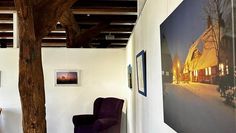 Im Kulturzentrum Murkens Hof sind Fotomotive von Bürger:innen zu sehen.