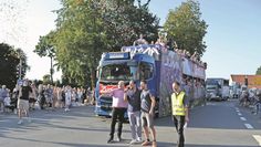 Manfred Knust (v. li.), Daniel Schneider, Frank Springer und Michael Tiedemann mit den Börde Move-Trucks im Hintergrund.